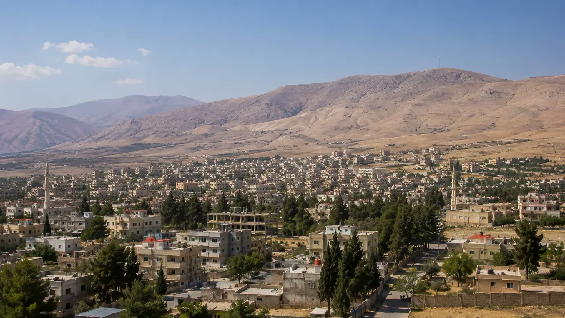 Mountain townscape representing Yabroud in the Qalamoun region.